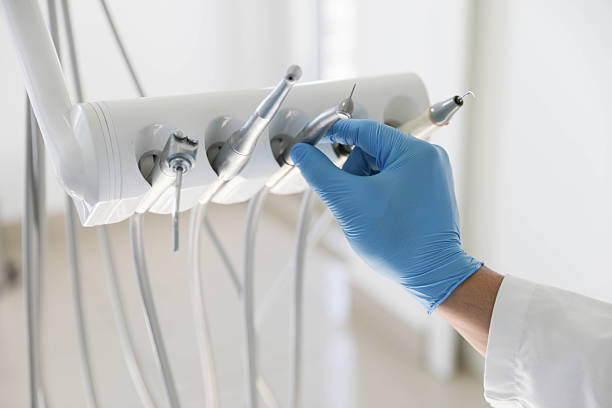 Professional Tooth Extraction technician working in Mooreland, OK
